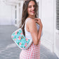 Peonies and Plumeria White and Blue Baguette Bag